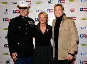 Captain Chris Ayers, Renee Ayers, and a guest