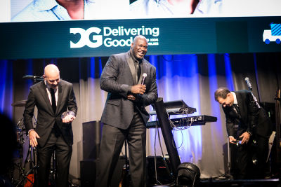 shaquille o-neal in A Glamorous Night Supporting Delivering Good