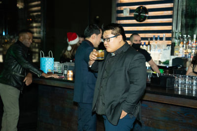 kim jong-un in Jon Harari's Annual Holiday Party