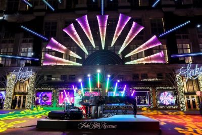 Saks Unveiled Its New Holiday Windows & Light Show With A Performance By Elton John!