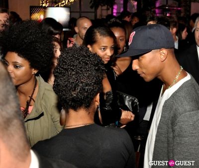 Pharrell with fans at Qream launch