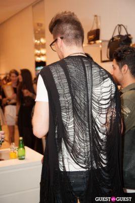 both shredded-vest in Moschino Celebrates Fashion's Night Out 2012