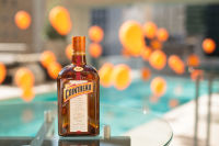 Guests gather poolside at the Cointreau Soiree at the Joule Dallas Hotel in Dallas, Texas on August 11, 2016. 
