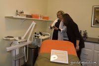 Beljanski Wellness Center staff with guest in treatment room.