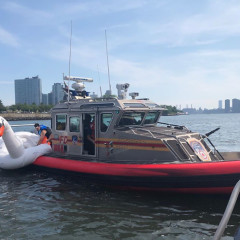 FDNY Saves Couple Stranded In A Swan Float On The East River...