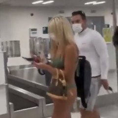 Kudos To This Woman Who Wore Nothing But A Mask & Bikini To The Airport