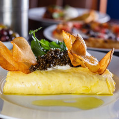 A Potato Chip Omelette Topped With Caviar? Meet The Rich Brunch Dish Of Your Dreams