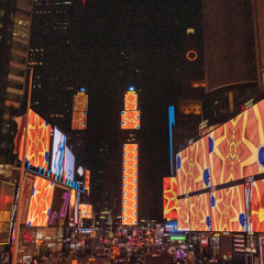 NYC's Hottest Art Installation Is Lighting Up Times Square Each Evening At Midnight