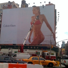 Breaking: Calvin Klein Tones It Down, Opts For Half Naked Woman On Billboard Over Threesome