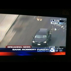 Photo Of The Day: Robin Hood Bank Robbers Make It Rain In South L.A. During Car Chase, Cause Riots